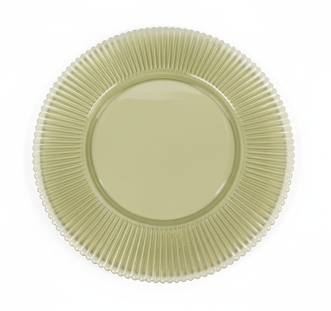 Light green charger plate with textured rim on a white background 